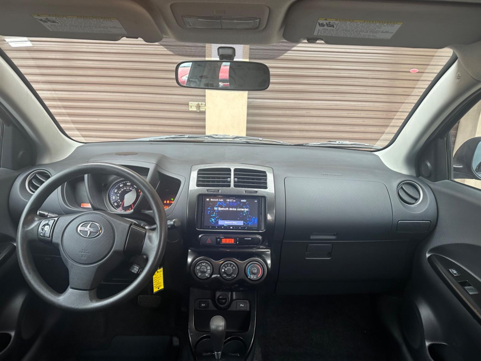 2009 Gray /Black Scion xD 5-Door (JTKKU104X9J) with an 1.8L L4 DOHC16V engine, automatic transmission, located at 30 S. Berkeley Avenue, Pasadena, CA, 91107, (626) 248-7567, 34.145447, -118.109398 - The 2009 Scion XD 4-Door Hatchback is a compact, versatile, and stylish vehicle that offers an exceptional driving experience. Located in the heart of Pasadena, CA, our dealership specializes in a comprehensive selection of used BHPH (Buy Here Pay Here) cars, including the dynamic Scion XD. This veh - Photo #14